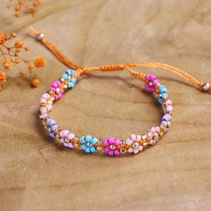 Geknoopte bloemen armband -  oranje