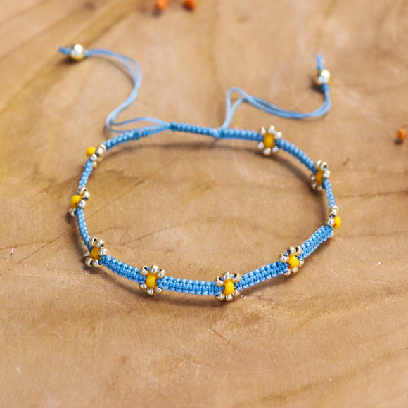 Geknoopte armband met bloemetjes - blauw